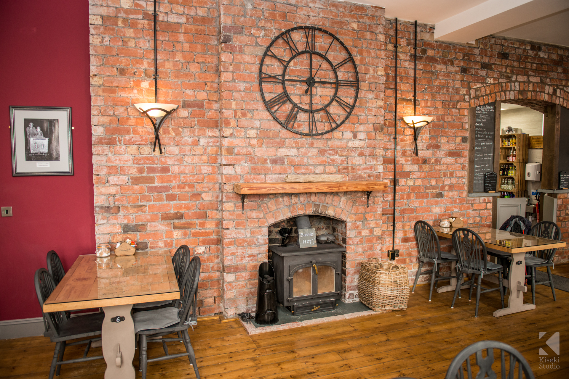 herdwicks-boutique-hotel-dining-area-open-fire-cosy-warm-lake-district-commercial-photography