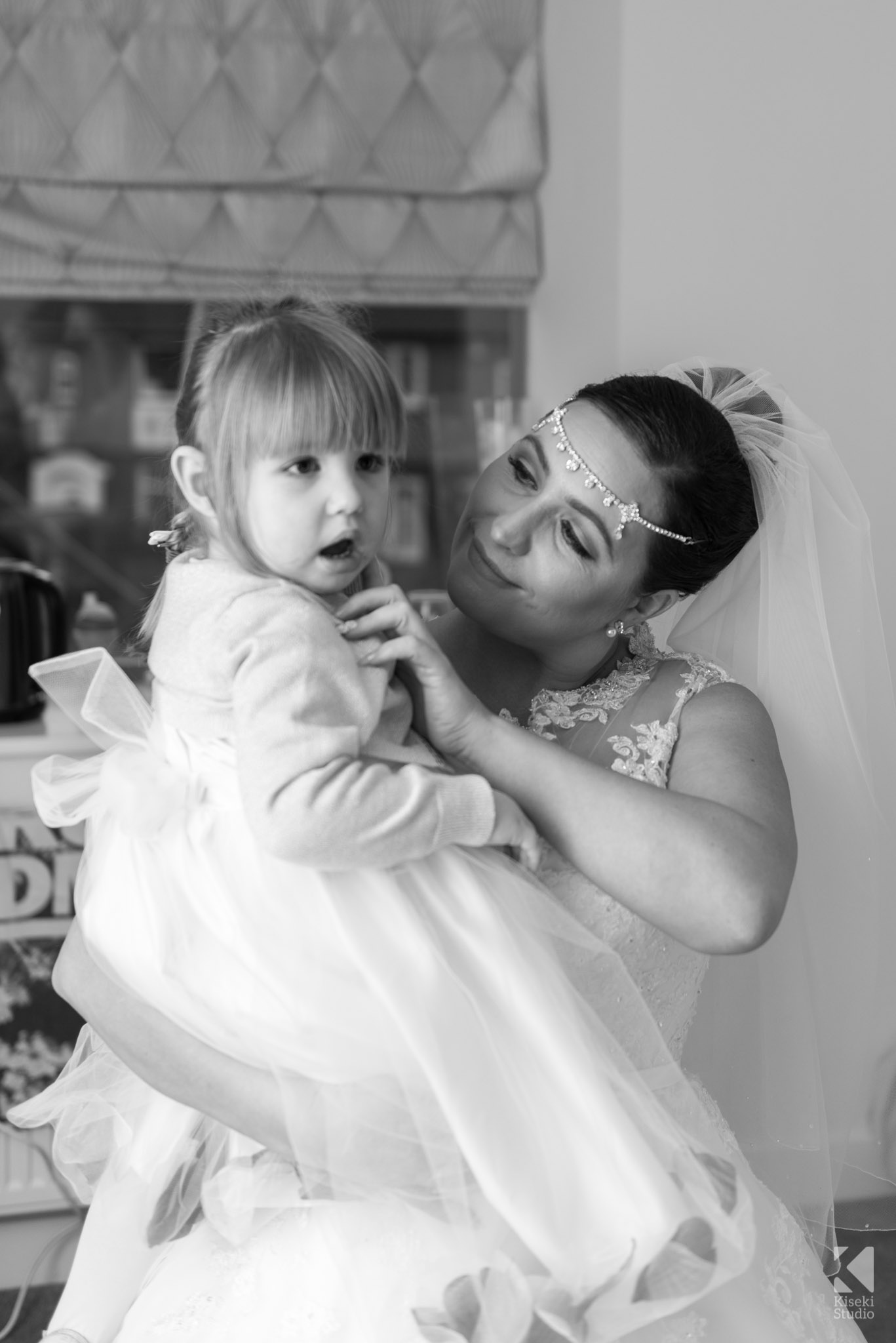 Bride and Daughter in wedding dresses