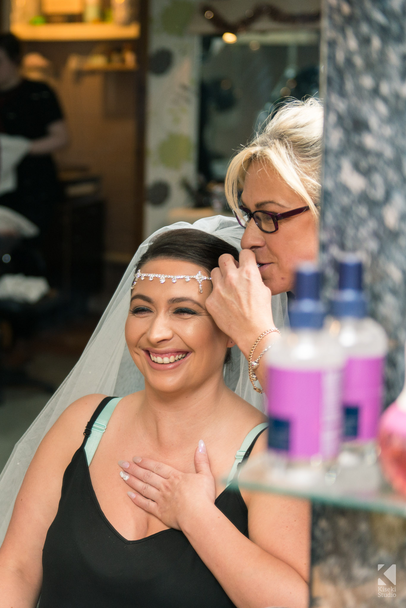 Bride having her hair and makeup done