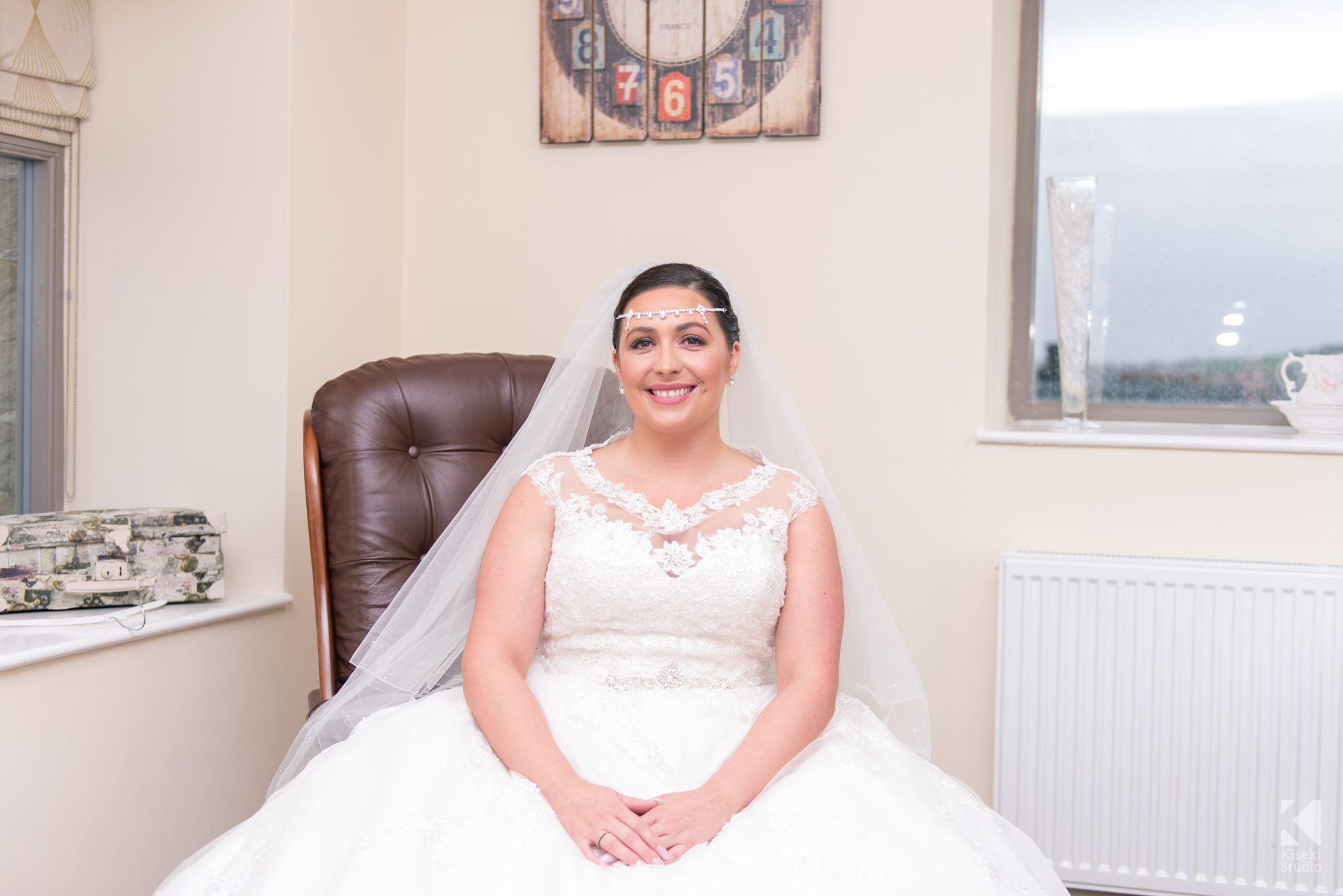 Bride sitting in the suite