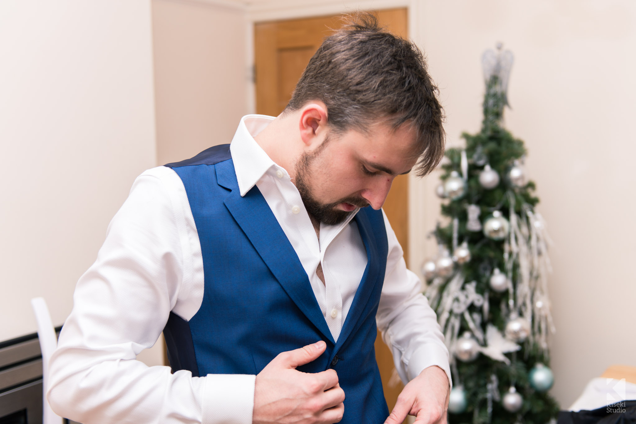 Groom preparing his suit