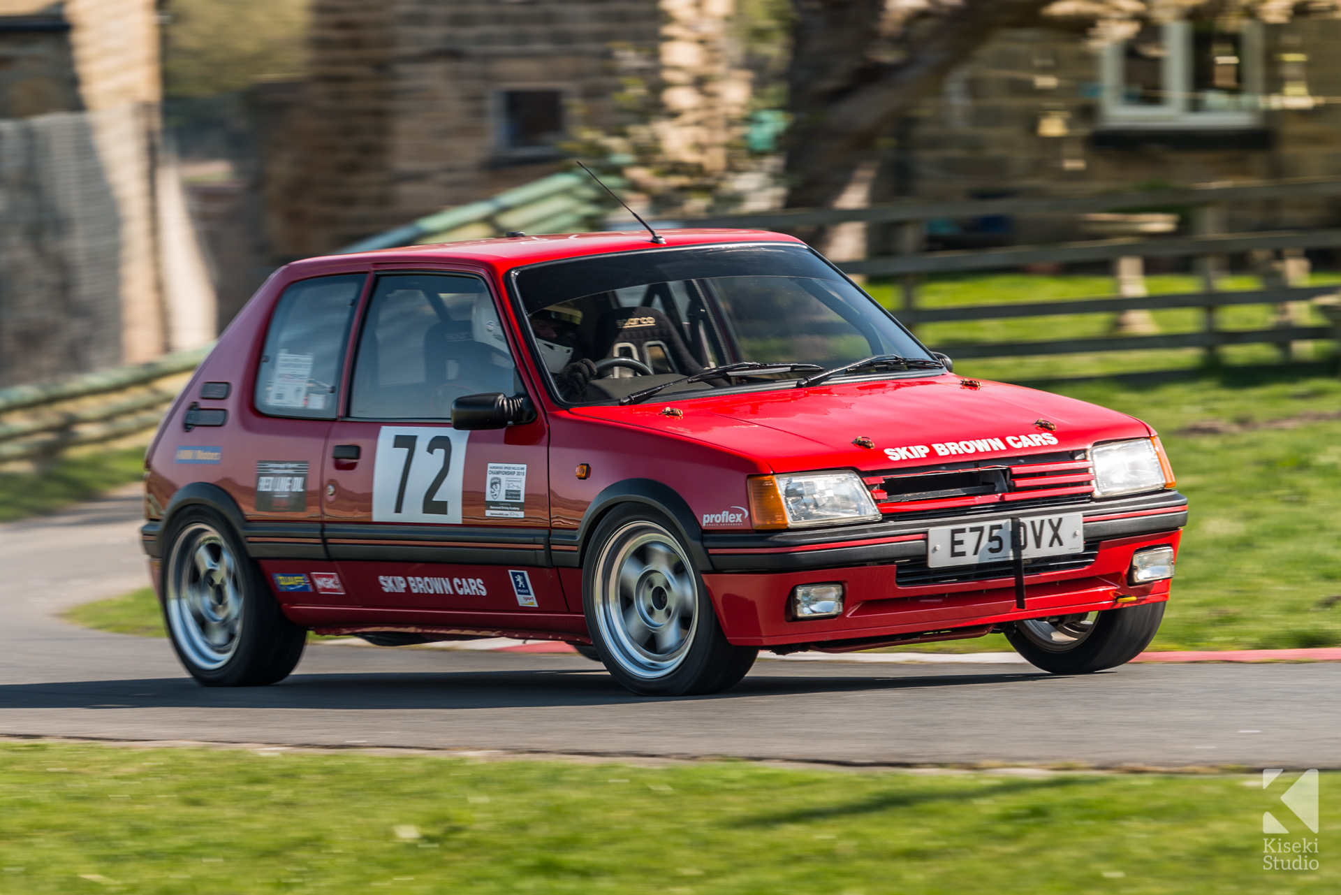 harewood-speed-hillclimb-april-2017-peaugeot-205-cornering-farmhouse-bend-red