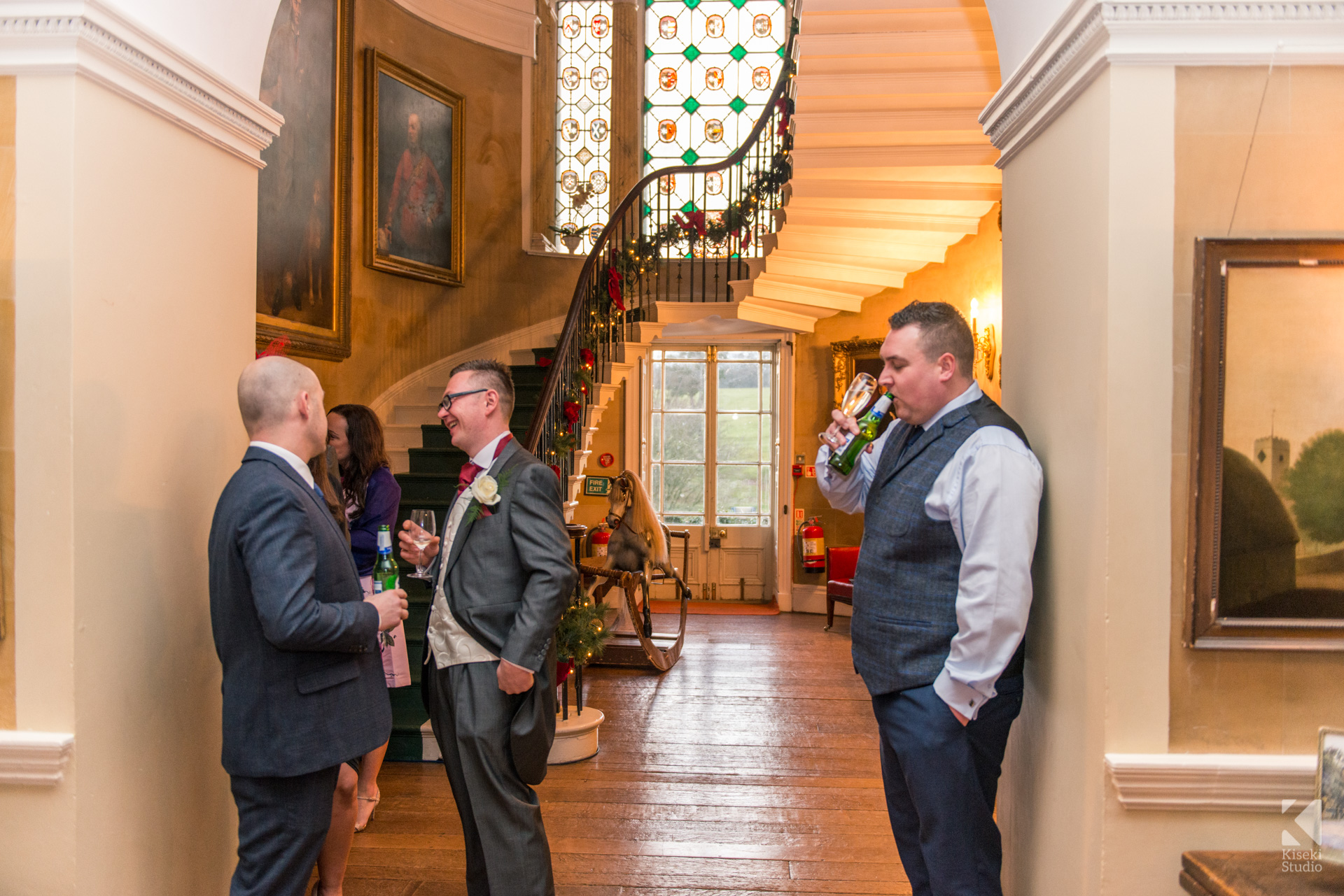 Ripley Castle Wedding - Guests enjoying a drink in the hallway