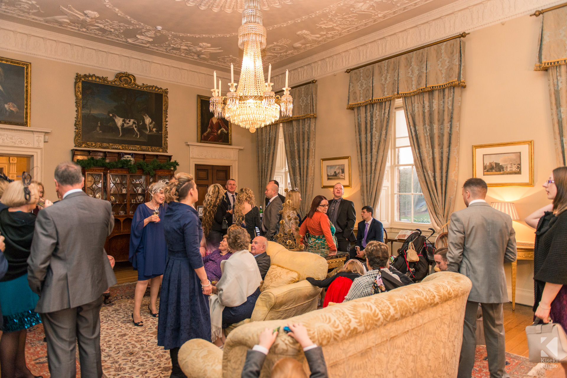 Ripley Castle Wedding - Guests enjoying a drink in the living area