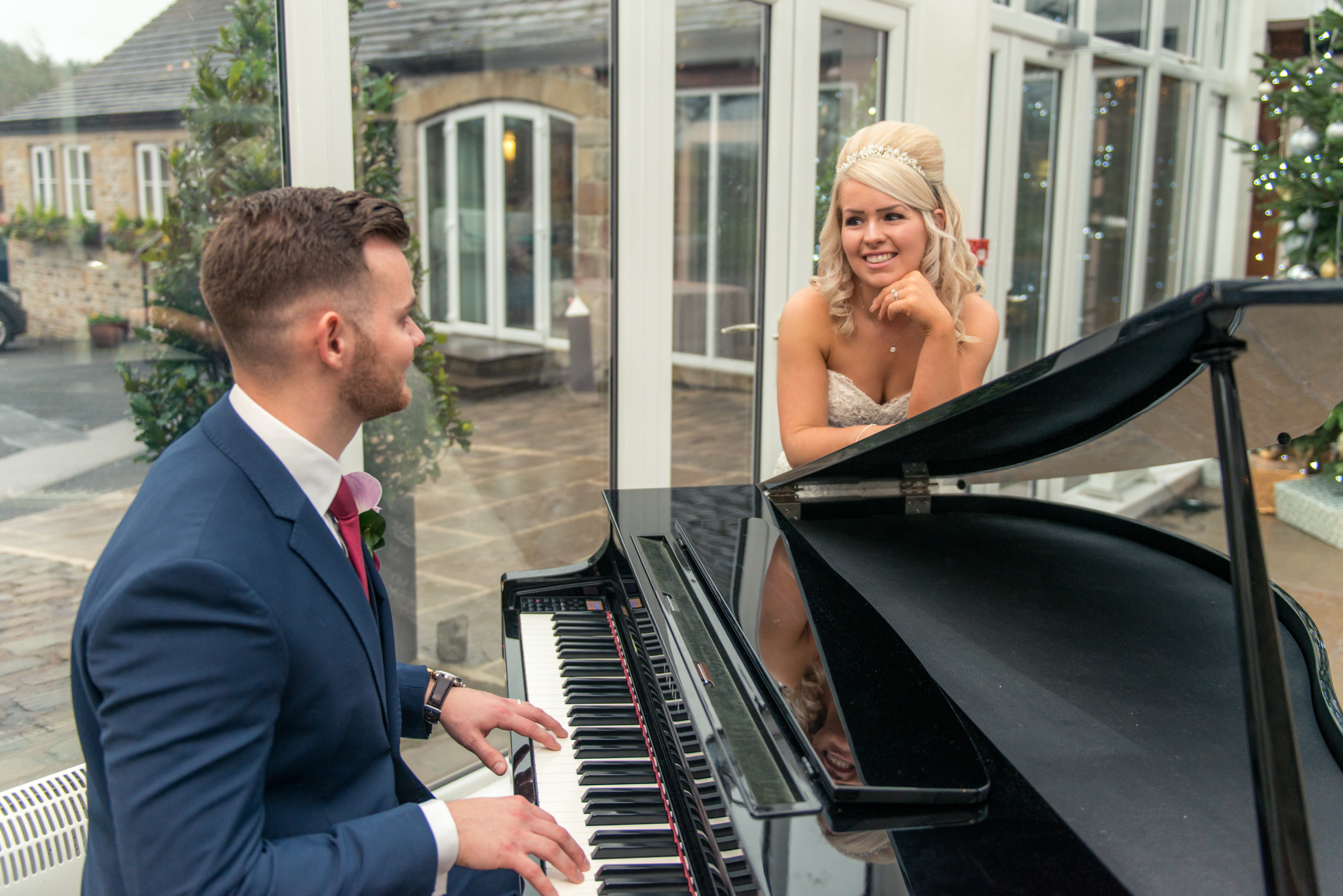 bride-groom-piano-playing-serenading-wedding-photography-coniston-hall-kiseki-studio