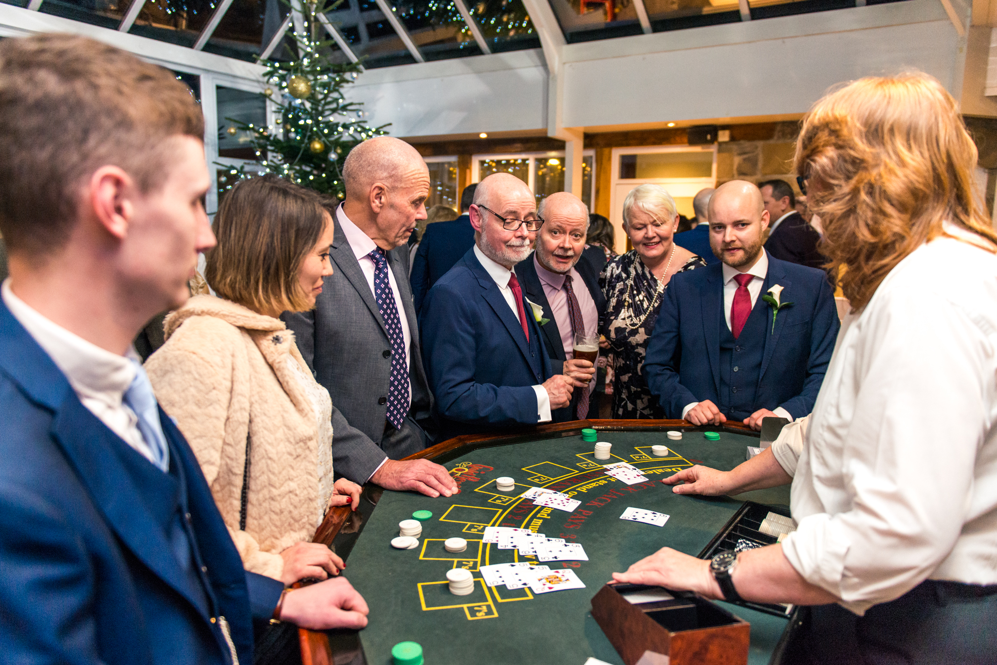 reception-poker-casino-guests-christmas-love-wedding-photography-coniston-hall-kiseki-studio